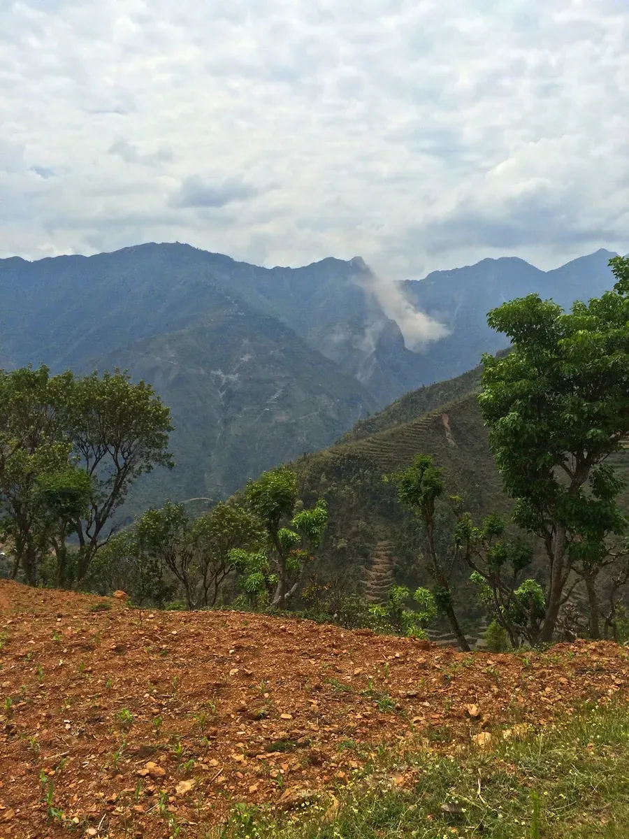 Terraced hills and a hazy mountain valley