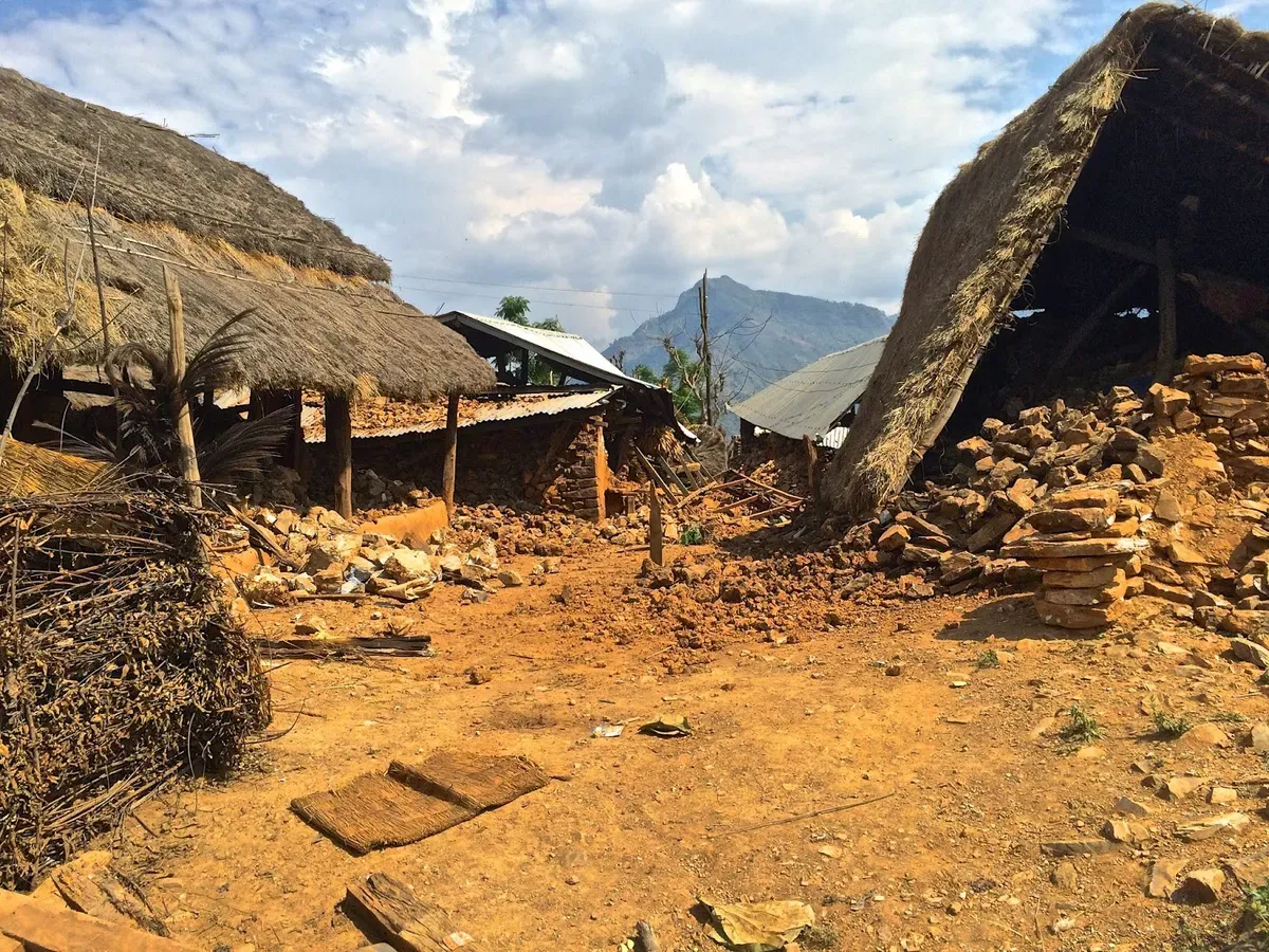 Rubble between damaged stone houses