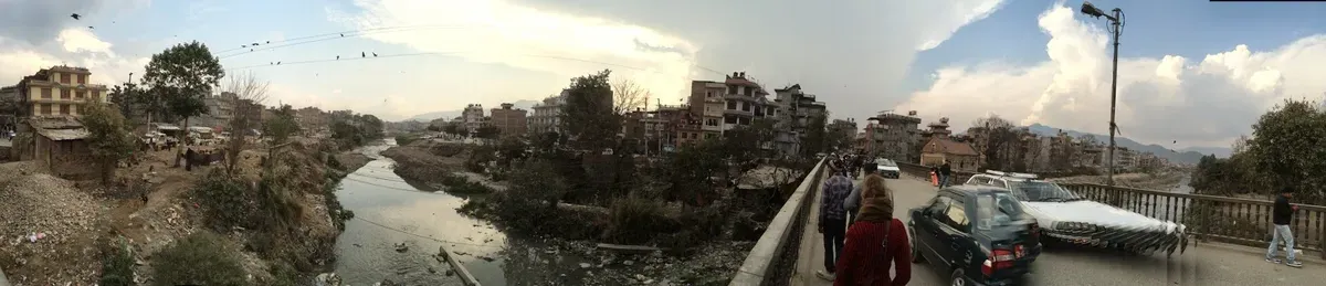 Panorama across the Bishnumati river and surrounding buildings